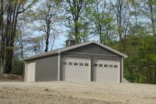 2-Car Garage with Side Entrance Door and Extra OH Door