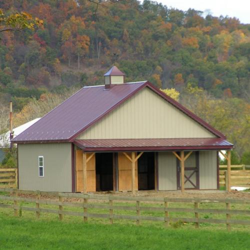 Pole horse barn with metal roof and siding