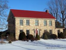 red-metal-roof-replacement-2-story-stone-house-mcalisterville