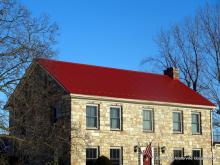 Red Metal Roof Replacement on 2-Story Stone House 003